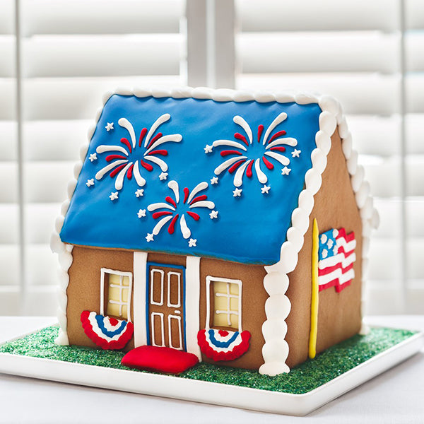 Star-Spangled Cookie House with USA flag on right side